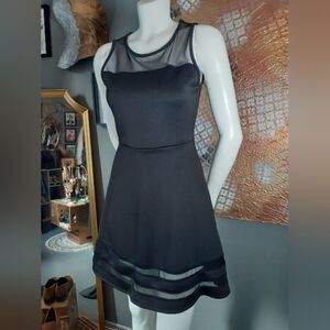 Rolla Coster Elegant Black Sleeveless Mini Dress!
